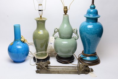 Lot 230 - A Chinese green ceramic table lamp and three other lamps