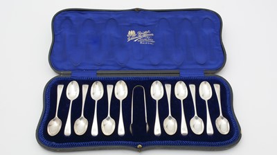 Lot 609 - An Edward VII set of twelve teaspoons and sugar tongs, by Josiah Williams & Co