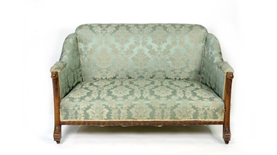 Lot 1295 - A 19th Century carved mahogany two-seater sofa.