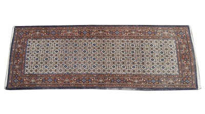 Lot 1003 - A Khorrasan runner carpet