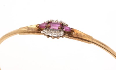 Lot 330 - A ruby and diamond bangle