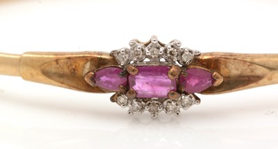 Lot 330 - A ruby and diamond bangle