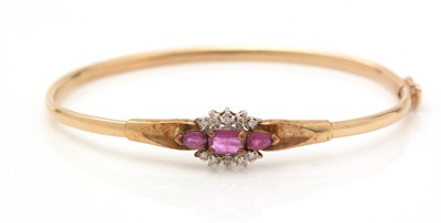 Lot 330 - A ruby and diamond bangle