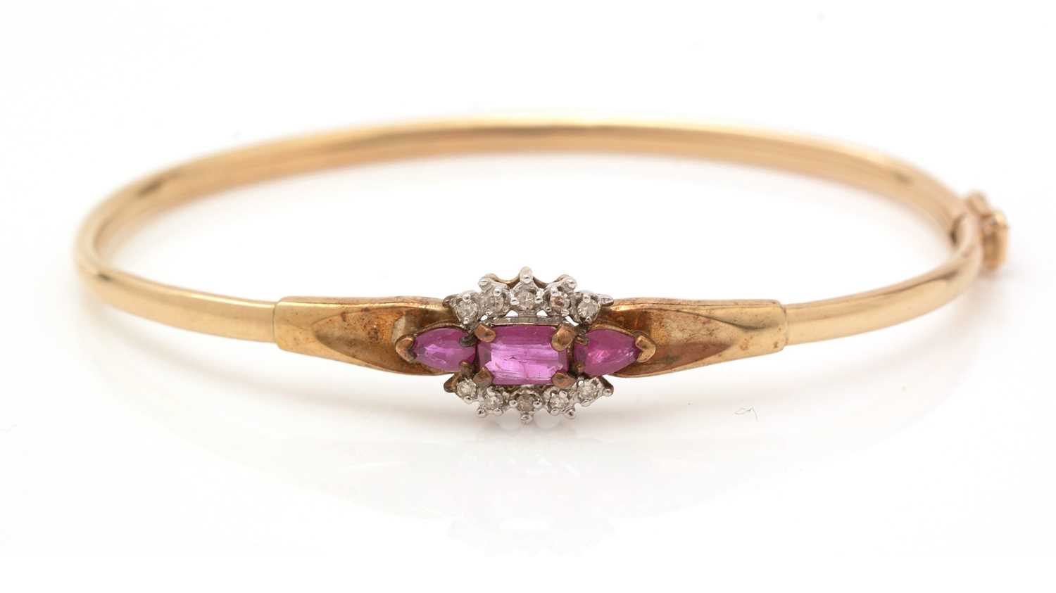 Lot 330 - A ruby and diamond bangle