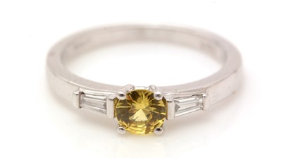 Lot 341 - A yellow sapphire and diamond ring