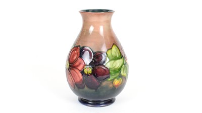 Lot 681 - Moorcroft Clematis flambe vase