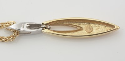 Lot 471 - An 18ct gold and diamond pendant with interchangeable chains
