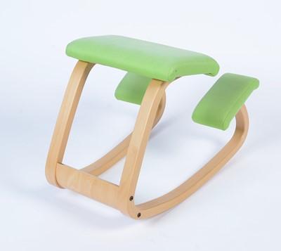 Lot 9 - Stokke after a design by Peter Opsvik: a bent plywood rocking/kneeling chair.