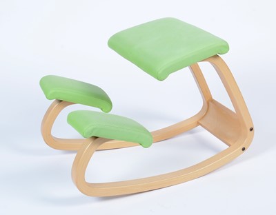 Lot 9 - Stokke after a design by Peter Opsvik: a bent plywood rocking/kneeling chair.