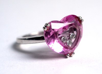 Lot 504 - Chopard "So Happy Diamond": a diamond and synthetic pink sapphire ring