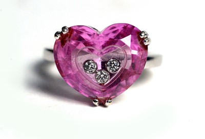 Lot 504 - Chopard "So Happy Diamond": a diamond and synthetic pink sapphire ring