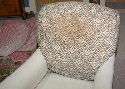 Lot 1350 - An early 20th Century armchair by Howard & Sons.