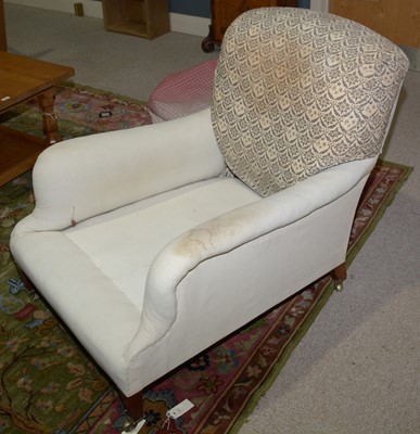 Lot 1350 - An early 20th Century armchair by Howard & Sons.