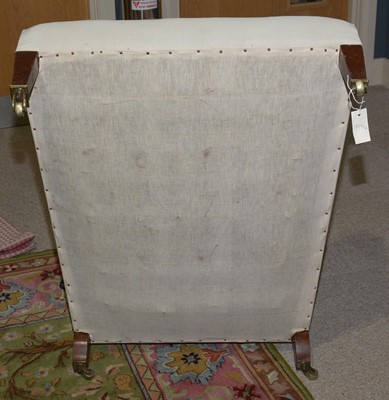 Lot 1350 - An early 20th Century armchair by Howard & Sons.