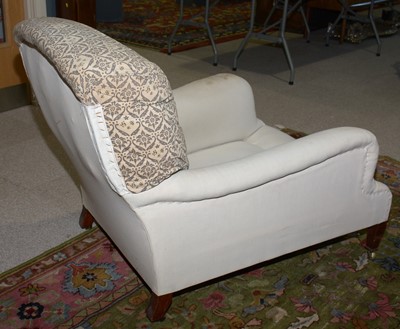 Lot 1350 - An early 20th Century armchair by Howard & Sons.