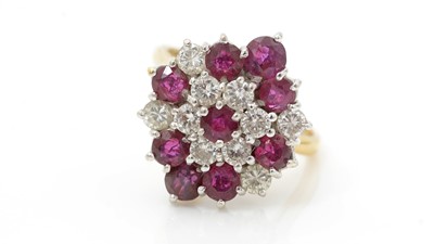 Lot 475 - A ruby and diamond cluster ring
