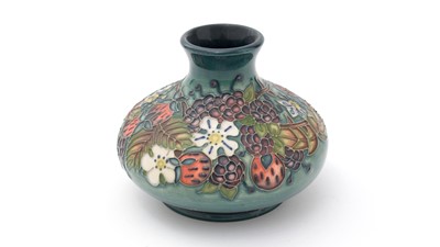 Lot 71 - Moorcroft Carousel pattern vase.