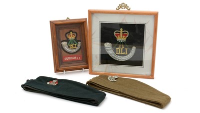 Lot 782 - DLI interest caps and badges.