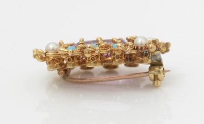 Lot 484 - A Victorian tourmaline, turquoise, pearl and emerald brooch