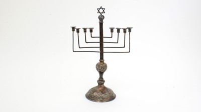 Lot 133 - A George V silver menorah.