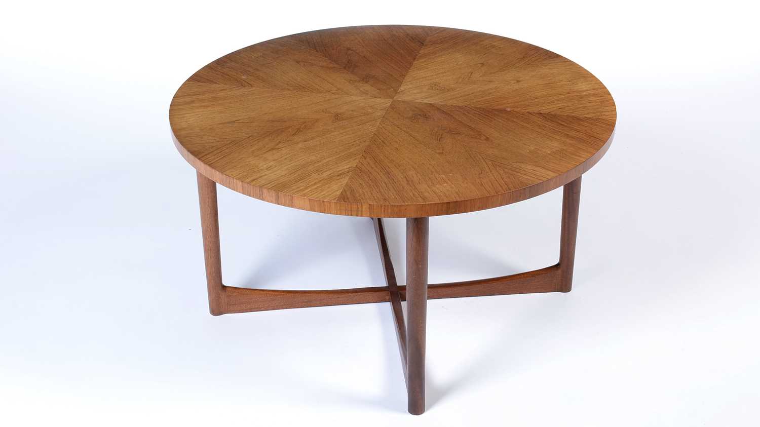 Lot 12 - Attr.  to A.H. McIntosh of Kirkcaldy: a mid Century rosewood circular coffee table.