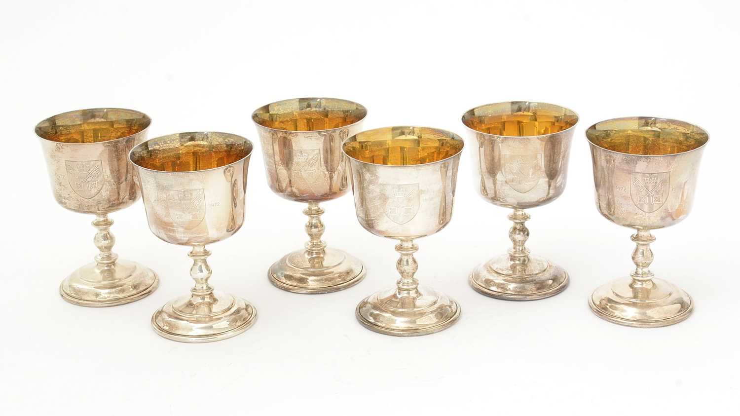 Lot 193 - A set of six Elizabeth II Limited Edition silver wine goblets.