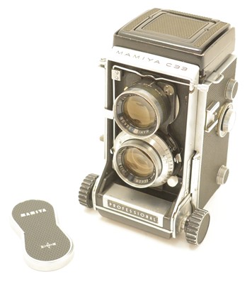 Lot 653 - Mamiya C33 Professional camera, with spare lenses