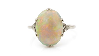 Lot 495 - A first half 20th Century opal ring
