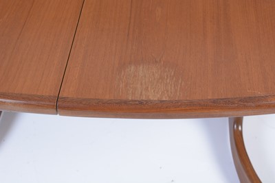 Lot 33 - G-Plan: teak oval extending dining table; and six chairs.