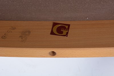 Lot 33 - G-Plan: teak oval extending dining table; and six chairs.