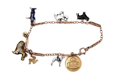 Lot 415 - A 9ct yellow gold and enamel charm bracelet