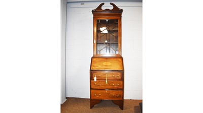 Lot 83 - A slender Edwardian mahogany and satinwood banded bureau bookcase.