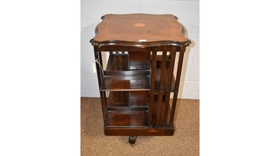Lot 5 - An early 20th Century inlaid mahogany revolving bookcase.
