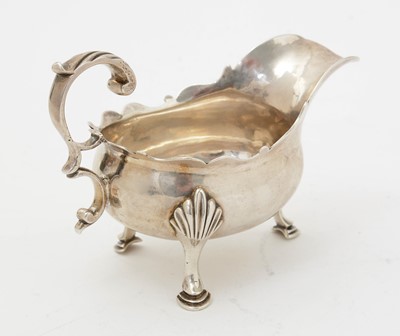 Lot 130 - An early George III silver cream boat.