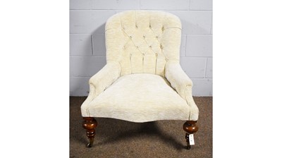 Lot 39 - A Victorian button-back armchair.