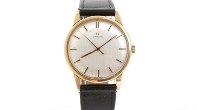 Lot 422 - Omega: a 9ct yellow gold cased manual wind wristwatch, and boxes