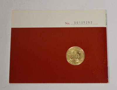 Lot 422 - Omega: a 9ct yellow gold cased manual wind wristwatch, and boxes
