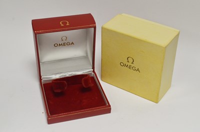 Lot 422 - Omega: a 9ct yellow gold cased manual wind wristwatch, and boxes