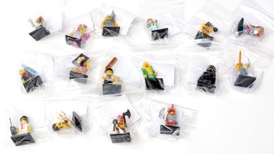 Lot 141 - A complete set of LEGO Collectable Minifigures, 71017 series 17 (2017), with open packaging.