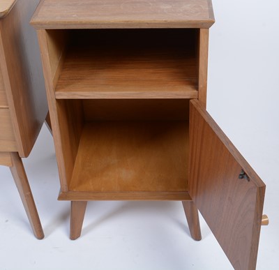 Lot 25 - Alfred Cox for A.C. Furniture: a mid Century teak and walnut bedroom suite.