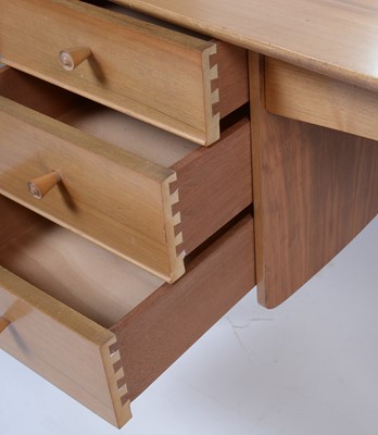 Lot 25 - Alfred Cox for A.C. Furniture: a mid Century teak and walnut bedroom suite.