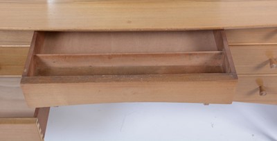 Lot 25 - Alfred Cox for A.C. Furniture: a mid Century teak and walnut bedroom suite.