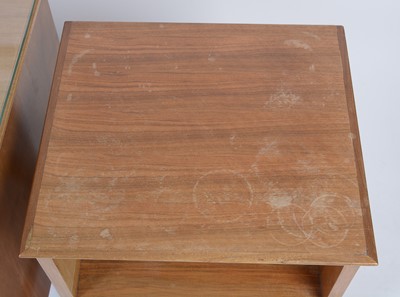 Lot 25 - Alfred Cox for A.C. Furniture: a mid Century teak and walnut bedroom suite.