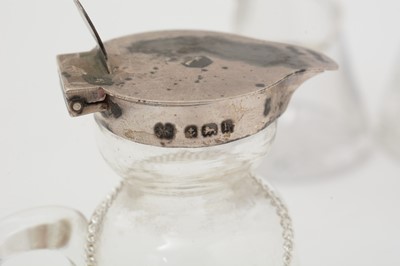 Lot 170 - Five various silver-mounted cut glass whisky tots/chota pegs; and five various labels.