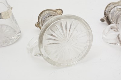 Lot 170 - Five various silver-mounted cut glass whisky tots/chota pegs; and five various labels.