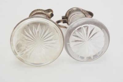 Lot 170 - Five various silver-mounted cut glass whisky tots/chota pegs; and five various labels.