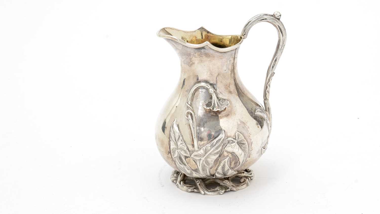 Lot 153 - A Victorian silver baluster cream jug.