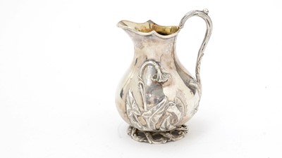 Lot 153 - A Victorian silver baluster cream jug.