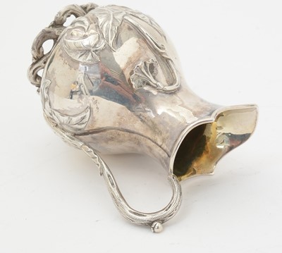 Lot 153 - A Victorian silver baluster cream jug.