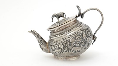 Lot 199 - A late 19th/early 20th Century Indian silver teapot.